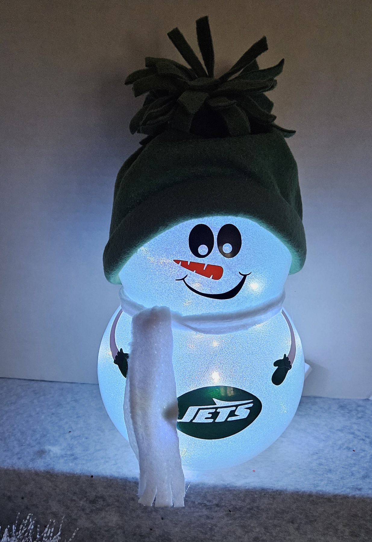 Lighted snowman glowing